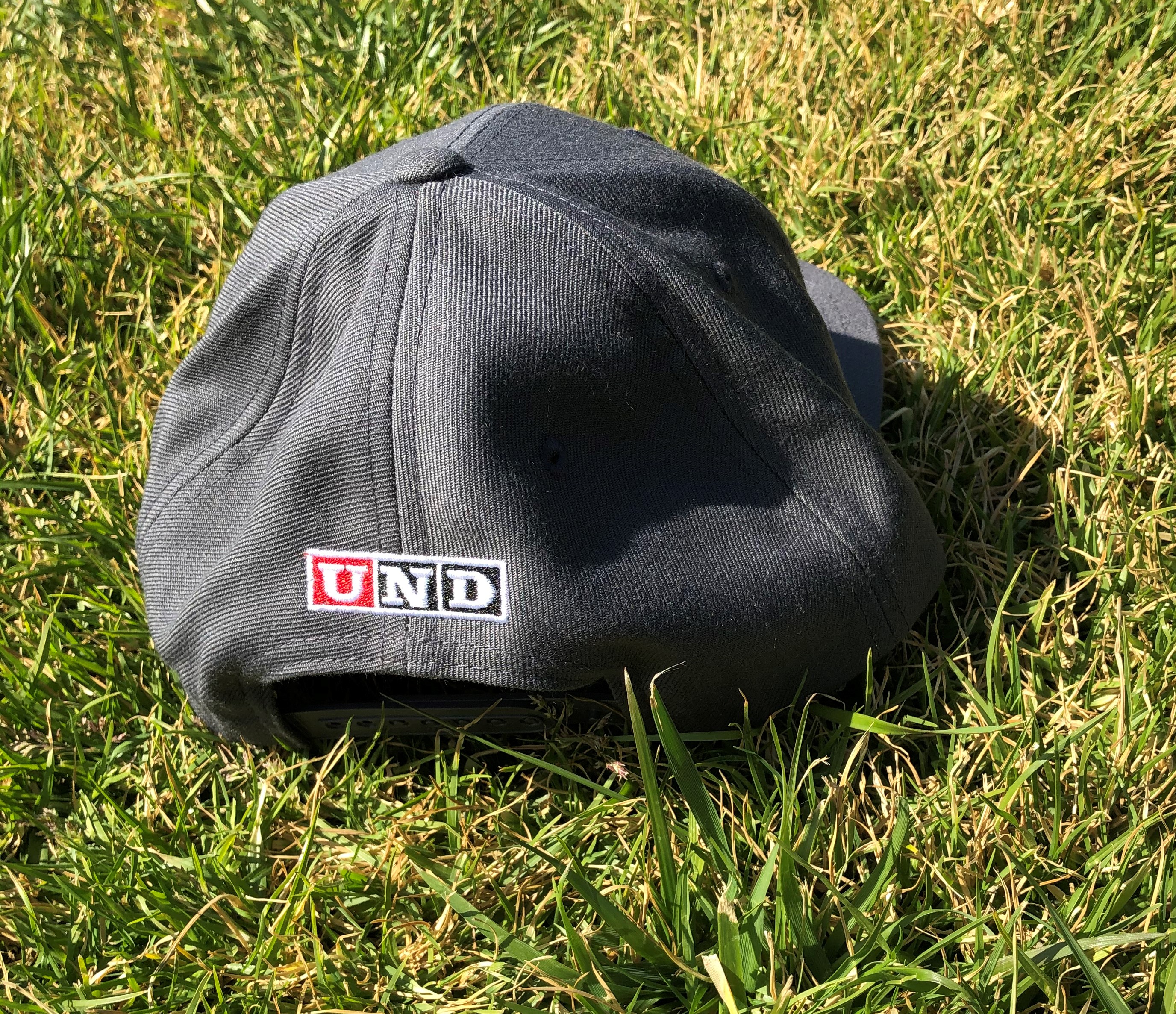 grey baseball cap back with UND logo