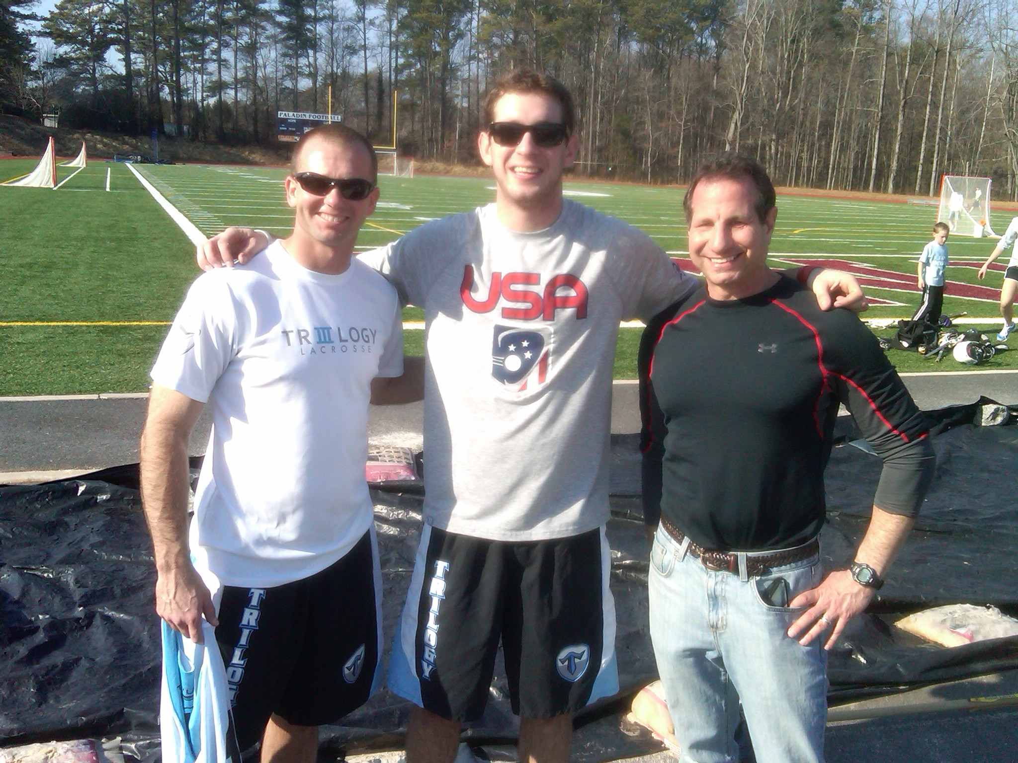 Coaches Dixon and Litow with Ned Crotty last Sunday.